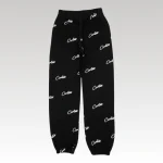 Corteiz All Over Print Joggers Black - Drip Slum